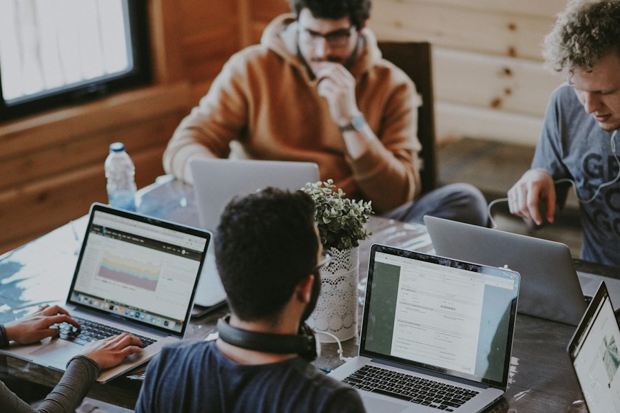 People collaborating around a digital project